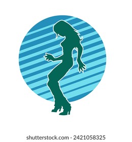 Silhouette of a female dancer in action pose. Silhouette of a slim woman in dancing pose.