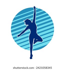 Silhouette of a female dancer in action pose. Silhouette of a slim woman in dancing pose.