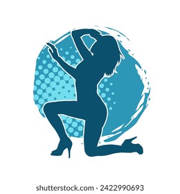 
Silhouette of a female dancer in action pose. Silhouette of a slim woman in dancing pose.