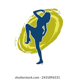 Silhouette of a female dancer in action pose. Silhouette of a slim woman in dancing pose.