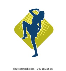 Silhouette of a female dancer in action pose. Silhouette of a slim woman in dancing pose.