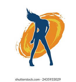 Silhouette of a female dancer in action pose. Silhouette of a slim woman in dancing pose.