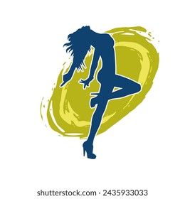 Silhouette of a female dancer in action pose. Silhouette of a slim woman in dancing pose.