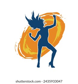 Silhouette of a female dancer in action pose. Silhouette of a slim woman in dancing pose.