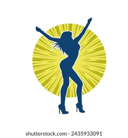 Silhouette of a female dancer in action pose. Silhouette of a slim woman in dancing pose.