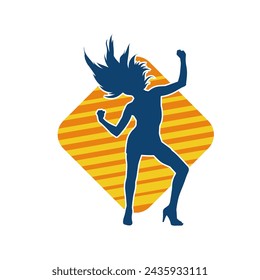 Silhouette of a female dancer in action pose. Silhouette of a slim woman in dancing pose.