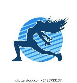 Silhouette of a female dancer in action pose. Silhouette of a slim woman in dancing pose.