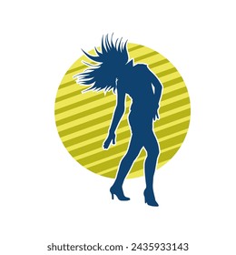 Silhouette of a female dancer in action pose. Silhouette of a slim woman in dancing pose.