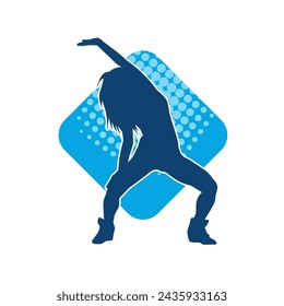 Silhouette of a female dancer in action pose. Silhouette of a slim woman in dancing pose.