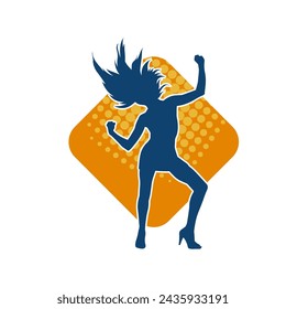 Silhouette of a female dancer in action pose. Silhouette of a slim woman in dancing pose.