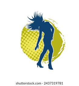 Silhouette of a female dancer in action pose. Silhouette of a slim woman in dancing pose.