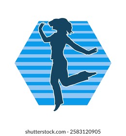 Silhouette of a female dancer in action pose. Silhouette of a slim woman in dancing pose.