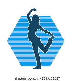 Silhouette of a female dancer in action pose. Silhouette of a slim woman in dancing pose.