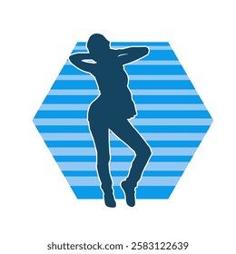 Silhouette of a female dancer in action pose. Silhouette of a slim woman in dancing pose.