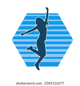 Silhouette of a female dancer in action pose. Silhouette of a slim woman in dancing pose.