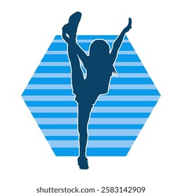 Silhouette of a female dancer in action pose. Silhouette of a slim woman in dancing pose.