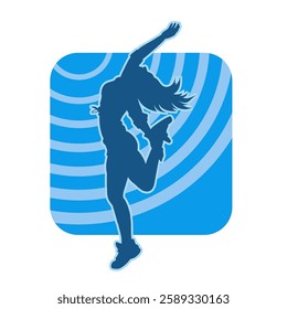 Silhouette of a female dancer in action pose. Silhouette of a slim woman in dancing pose.