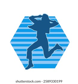 Silhouette of a female dancer in action pose. Silhouette of a slim woman in dancing pose.