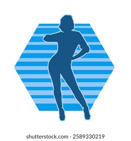 Silhouette of a female dancer in action pose. Silhouette of a slim woman in dancing pose.