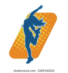 Silhouette of a female dancer in action pose. Silhouette of a slim woman in dancing pose.