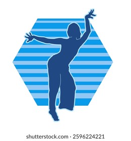 Silhouette of a female dancer in action pose. Silhouette of a slim woman in dancing pose.