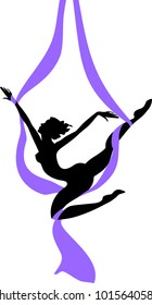 Silhouette of female dancer on purple aerial silk