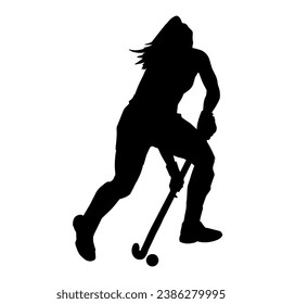 Silhouette de una atleta de hockey sobre hierba en acción. Silhouette de una mujer jugando al hockey sobre hierba.