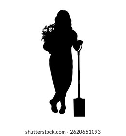 Silhouette of a female gardener carrying a large shovel and carrying flowers in a pot