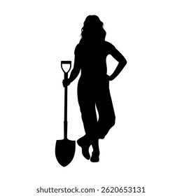 Silhouette of a female gardener carrying a large shovel