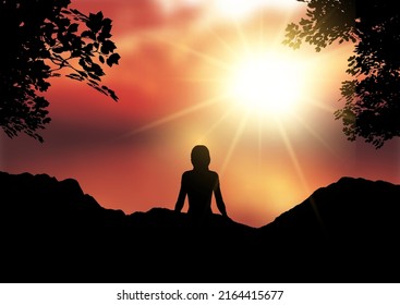 Silhouette of a female sat against a sunset sky landscape