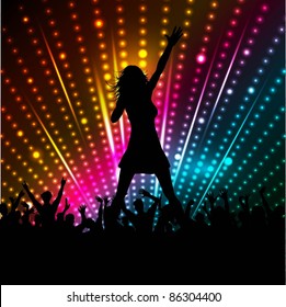 Silhouette of a female singer performing in front of a crowd