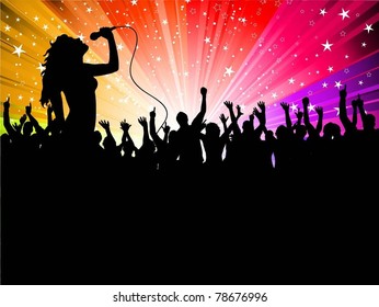 Silhouette of a female singing in front of a large crowd