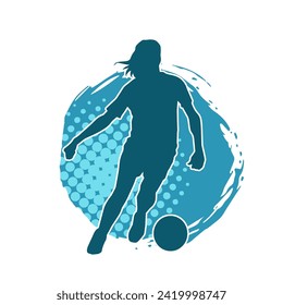 Silhouette of a female soccer player kicking a ball. Silhouette of a football player woman in action pose.