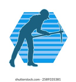 Silhouette of a female wearing worker costume in pose with pick axe tool. Silhouette of a woman in miner costume carrying pick axe tool.