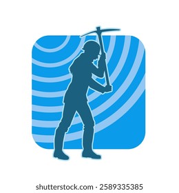 Silhouette of a female wearing worker costume in pose with pick axe tool. Silhouette of a woman in miner costume carrying pick axe tool.