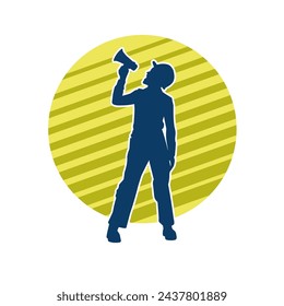 Silhouette of a female worker doing painting work. Silhouette of an interior painter worker.
