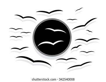 A silhouette of flock of birds against the black sun