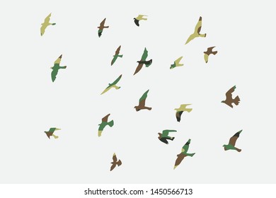 silhouette of a flock of flying birds