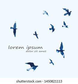 silhouette of a flock of flying birds