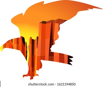 Silhouette of flying eagle with double exposure of western rocks.