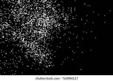 Silhouette of food flakes such as salt or almond or wheat flour spread on the flat surface or table. Abstract grainy texture isolated on black background. Top view of dust, sand blow or bread crumbs. 