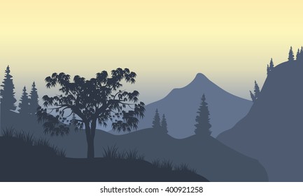Silhouette of forest and mountain with gray background