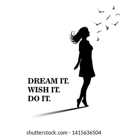 Silhouette of freedom girl with  birds. Dream it. Wish it. Do it. Motivational saying