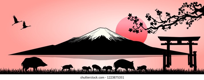 Silhouette Fuji mountain at sunset. Family of wild boars on the background of Mount Fuji. 