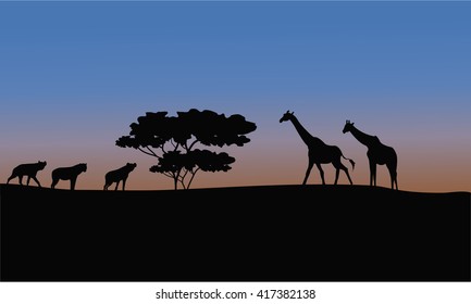 Silhouette of giraffe and puma in the park