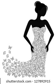 Silhouette of a girl in a butterfly dress flying apart