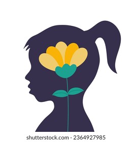 A silhouette of girl child with flower inside. Kid mental health concept.