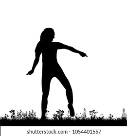 silhouette of girl dancing on grass