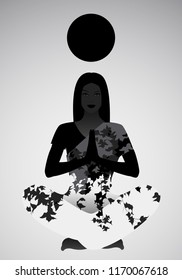 Silhouette of girl doing yoga or meditation under a black sphere