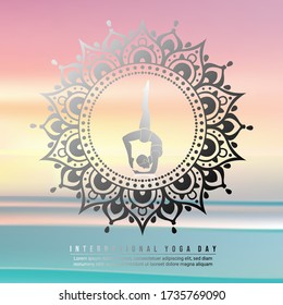 Silhouette girl doing yoga pose, with mandala circle around and abstract gradient sea and sky as background. Suitable for international yoga day
